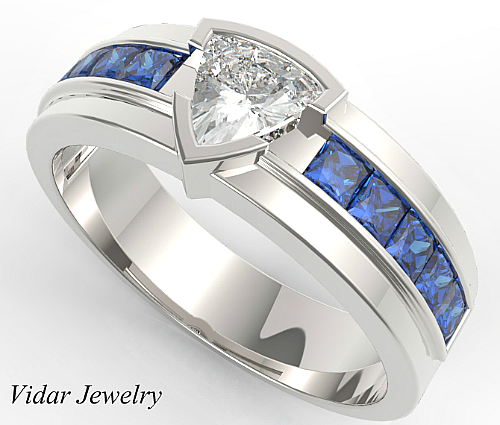 Trillion cut Wedding Ring with princess cut blue sapphires for him from Vidar Jewelry. We can customize in any gemstone or gold color. Contact us for more.